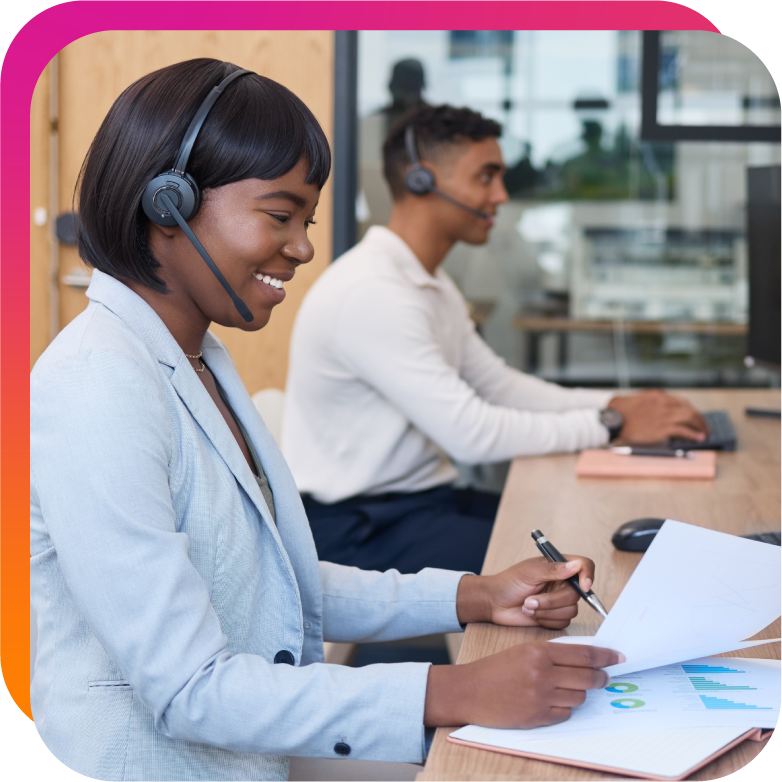 Customer service representatives working in a modern call center, reviewing documents and communicating with clients, representing a secure and trustworthy customer service environment.